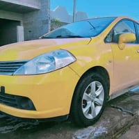 نيسان تيدا موديل 2006 رقم كركوك منظومة غاز رقم مميز ضربة جاملغ الخلفية...