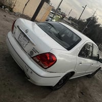 من رخصه مدير الكروب نيسان سني 2006 رقم بغداد كير محرك صدر تبريد كله جا...