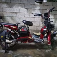 دراجة كهربائية • شاحن • قفل