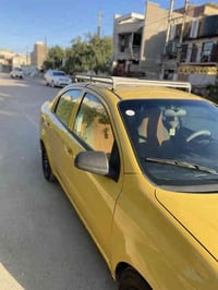 سيارة افيو 2009 امريكي مكينة 1600 كير ومحرك مكفولات ✍️وتبريد ثلج ❄️ غر...