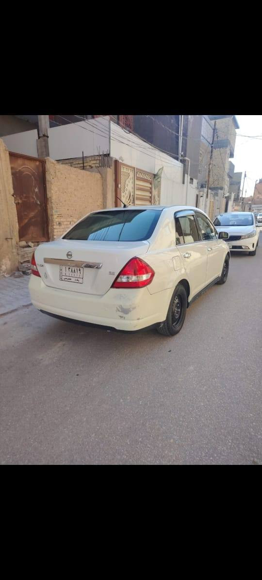 ***********نيسان تيده 2009 بيها جاملغ الخلفي والباب والباقي كفاله جديده كير مكينه حداديه السعر ٧٣ مكان النجف حي الجمعيه
