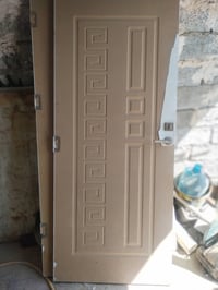 أبواب خشب • توركس • أبواب حديد دفتري