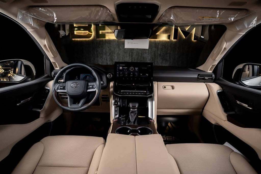 Toyota Land Cruiser GXR 2026 Twin Turbo
للتفاصيل الاتصال على أ. محمد فتحي 
01224774546📞
Power & Performance
Engine: 3.5L V6 Twin Turbo
Horsepower: 409 hp @ 5200 rpm
Torque: 650 Nm @ 3600 rpm
Transmission: 10-Speed Automatic
Drivetrain: Full-Time 4WD
Overall Length: 5145 mm
Overall Width: 1980 mm
Overall Height: 1890 mm
Gross Vehicle Weight: 3230 kg
Fuel Tank Capacity: 110 Liters
Fuel Efficiency: 9.3 km/L
Seating Capacity: 7 Passengers
Number of Doors: 5
Tire Size: 265/55R20
Premium Leather Seats
Ventilated Front & 2nd Row Seats
Power Front Seats with Driver Memory
Power-Folding 3rd Row Seats
4-Zone Automatic Climate Control
Leather and Wood Steering Wheel
Power Tilt & Telescopic Steering with Memory
Wireless Charger
12.3” Navigation Display
11” Rear Seat Entertainment with Bluetooth
JBL Sound System with 14 Speakers
Optitron Meter with 7” Multi-Information Display
Heads-Up Display (HUD)
Keyless Entry
Remote Engine Start
Tonneau Cover
Front, Side, Curtain & Knee Airbags
Adaptive Cruise Control (Dynamic Radar)
Blind Spot Monitor
Pre-Collision System (PCS)
Lane Departure Alert with Lane Trace Assist
Adaptive High Beam System
360° Camera with Washer
3D Multi-Terrain Monitor
Crawl Control
Parking Support Brake
ABS (Anti-Lock Braking System)
Brake Assist (BA)
Torque-Sensing Limited Slip Differential (LSD)
eCall Emergency System
Adaptive Variable Suspension (AVS)
20” Alloy Wheels
LED Headlights with DRLs & Auto Leveling
LED Fog Lamps
Power Tailgate with Kick Sensor
Power-Retractable Side Mirrors with Chrome Finish & Reverse Auto-Tilt
Front & Rear Aerokit Bumpers
Roof Rails
Rear Spoiler
Sunroof
Headlamp Cleaners القاهرة, مصر


**إذا كنت صاحب هذا الإعلان وتريد حذفه لأي سبب، رجاءا أرسل رسالة إلى الدعم الفني**