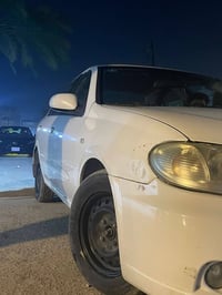 نيسان سني ٢٠١٠ ياباني للبيع مكفولة ماعدا باب السائق والباب الوراه بيهن...