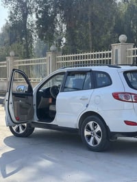 سنتافي 2012 7راكب  فول مواصفات 1/1  حساسات  ثلاجه بالتكوه  سلايد وبصمة...