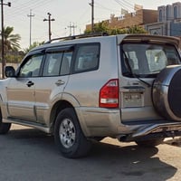باجيرو ٢٠٠٦ • اصفر ذهبي • رقم ديالى