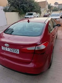 سيراتو ٢٠١٦ • احمر ماروني • رقم بغداد دولي