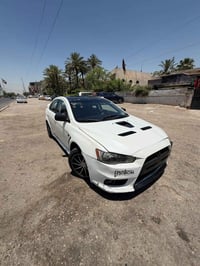 لانسر قرش GT گير عادي ✈️✈️2009 مكينه 2000 فول فتحه بصمه كشنات تحكم كهر...