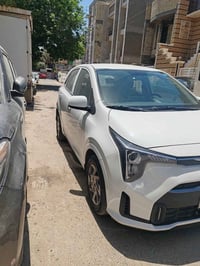 كيا بيكانتو موديل 2024 رقم بغداد باسمي ضمان شركه الدولية  سياره بحاله ...