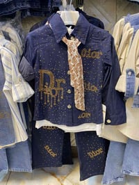 ملابس أطفال • ٦-١٢ سنة