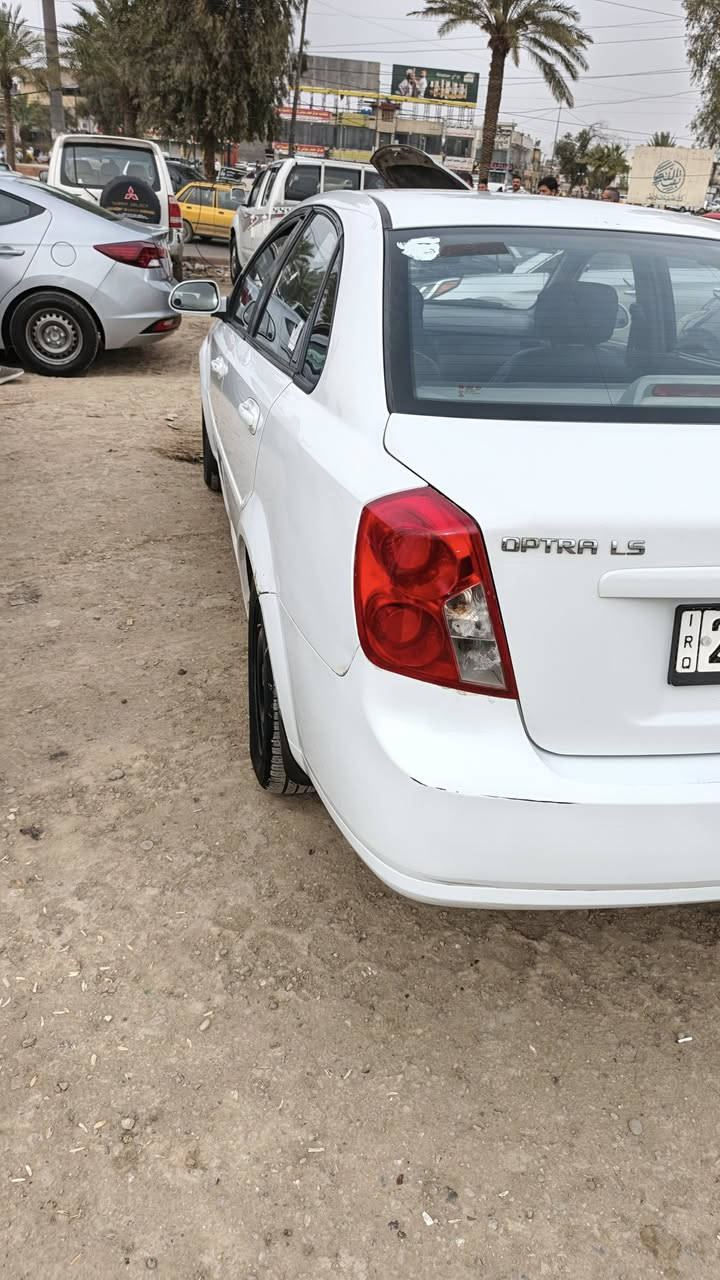 سلام عليكم ابترا ألفين و ١١ البيع مكفوله محرك وكير  وصدر تخم تاير بيها بس باب صبغ رقمها ذي قار بسمي نكليزي سنويه ال ٣٢ مكان بغداد حي النصر السعر ٧٠ وبيها مجال قليل ‏‪***********‬‏ اتصال
