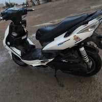 كامكو رايسنك ١٥٠ • دراجة حلوة • نهضة