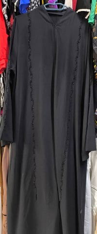 عروض الخميس • عباية • فستان