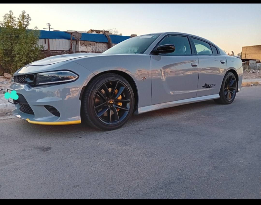 دوج جارجر  ::GT:: سوبر تراك
الموديل :2022
اللون : سموك
العداد : 42 ::
المحرك : V6.  3.6L .

الحادث : موضح بل صور فقط صبغ دعاميتين   بيها طخه شطح بل براكيت مال دعاميه الاماميه. وراجع بارد حادث امريكه الدعاميه   الخلفيه فاتحيها  بامريكه   وبك لايت بلادي اجه ويها بيها ثلاث اربلكات لان لابسين حزلم. راديترات وغاز تبريد بلادي شركه تبريد ثلج  ::::: السعر (خاص وتدلل) 

رقم صاحب السيارة ☎️   ***********

المواصفات : السياره فول 1/1 عدئ فتحه 
* مكابح رياضية برمبو اصليه  مع دبلات لون
اصفر . SRT مع كت كامل SRT
شوته رياضي
* ويل قياس 20 انچ اسود . 
بيها صوت  بل اكزوز يختلف عن العاديه: :::
* ستيرن رياضي D . 
* مقاعد رياضية من الجلد والشامو(كنتاره)
* رادار نقطة عمياء + لد ترحيب . 
* مصابيح أمامية اصفر  . 
* كشافات الضباب زنون . 
* المصابيح الأمامية عليها متغير مع اشاره اللد الاصفر الشكل الجديد :::
* الشاشة مع اوپشنات SRT . مع كار بلي 
* سستم صوت الپاين  .
* مقاعد أمامية كهربائية عدد 2 . 
* ذاكرة لحفظ وضعيات الجلوس (ميموري) . 
* مقاعد أمامية تبريد وتدفئة . 
* مقاعد خلفية تدفئة . 
* تشغيل عن بعد . 
* ستيرن كهربائي . 
* تدفئة ستيرن .  
* مرايا متحسسة للاضاءة العالية الوسطيه وجهة السايق.
* كير شفتر بالستيرن .
*تحكم ستيرت كهربائ
*بيها جهاز انتذار مشدور من امريكه
*كامره  دواره 
*  صدر بلادي برغي ما مفتوح بيها ناعمه بل طسه 
*مكان سياره بغداد.
