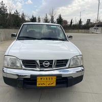 نیسان پیکاب 2006 سپی ناو سوور بەس یە ک پە لە بۆیاخی هەیە  لای جە مە لە...