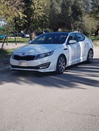 كيا اوبتما خليجي موديل 13 كير محرك تبريد تخم تاير بحاله جيده السياره ب...