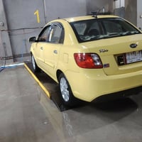 السلام وعليكم كيا ريو 2011 بدون ضرر فقط تلقطين  مري كهرب شفط  كير اوتو...