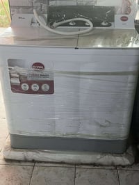 غساله للبيع مستعمله قليل بعدها بنايلون  07750124944
