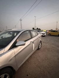 اكسنت ١٤٠٠ • رقم نجف • شاشة وكامرة