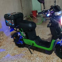 R9 • دراجة كهربا • مع مجال