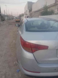 اوبتيما 2013 رقم بغداد بسمي تحويل ثاني يوم سنويه جديده بيها قطعتين صبغ...