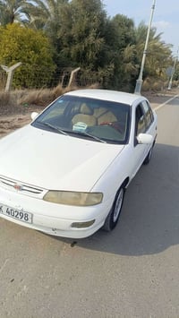 كيا سيفيا موديل1995 محرك مسكر 2000 سنويه لل29 رقم بغداد انكليزي  للاست...