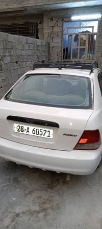 اكسنت • ٢٠٠١ • كير عادي
