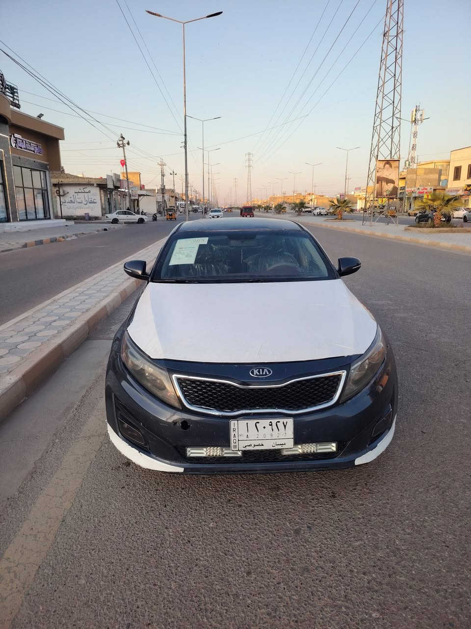 كيا اوبتما 2015 وارد امريكي بيها حادث بخشم البنيد والبنيد مبدل الكير وحداديه مكفولة بيها بارد بالصندوق وبيها بارد بالجاملغ الخلفي الأيمن وبارد بالباب الخلفي السيارة مامصبوغ بيها ولا شي بس بوارد  مكانها ميسان وسعرها 107 وبيها مجال  رقمي ***********
