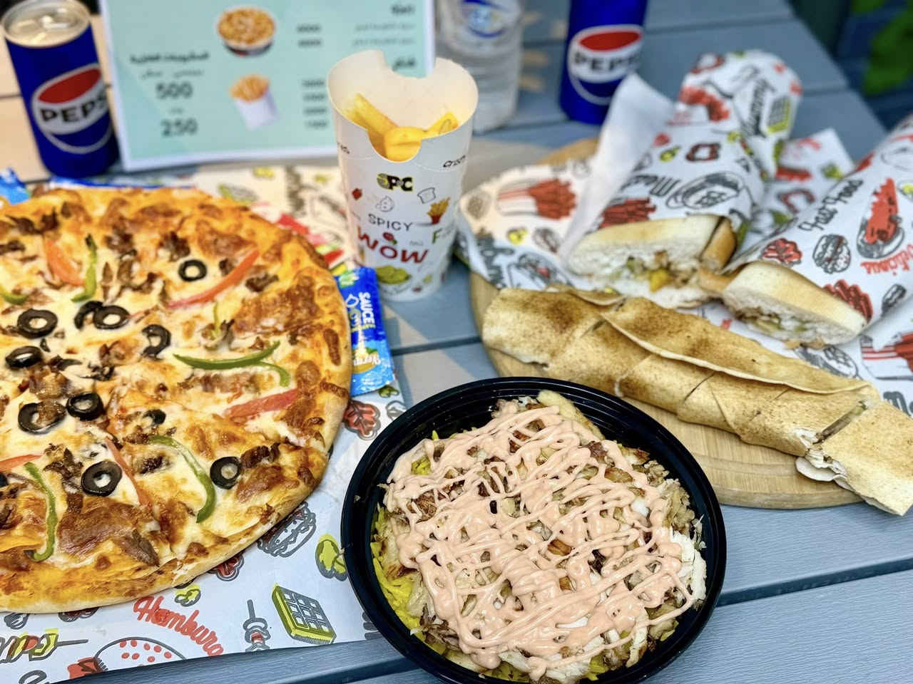 ✨ عروض مميّزة من شاورما أبو ألحسن  للاكلات الغربية ✨
استمتعوا بألذ الوجبات وبأسعار مناسبة من مطعم شاورما أبو الحسن 🌯🍕
🥙 العرض الأول – 10,000 دينار
 • 4 شاورما
 • 1 كلاص فنكر جبن
 • 2 بيبسي

🍕 العرض الثاني – 12,000 دينار
 • 1 بيتزا حجم كبير
 • 2 شاورما
 • 1 كلاص فنكر
 • 2 بيبسي

🍕 العرض الثالث – 15,000 دينار
 • 2 بيتزا وسط
 • 1 ريزو
 • 1 كلاص فنكر
 • 2 بيبسي

🥙 العرض الرابع – 5,000 دينار
 • 2 شاورما
 • 1 كلاص فنكر
 • 1 بيبسي

🍕 العرض الخامس – 20,000 دينار
 • 2 بيتزا وسط
 • 2 ريزو
 • 2 شاورما
 • 2 بيبسي

🍕 العرض السادس – 13,000 دينار
 • بيتزا وسط
 • 3 شاورما
 • 2 بيبسي
📌 العنوان:
الحلة – مقابل تقاطع باب الحسين – قرب مصرف بغداد القديم

📞 للحجز والتوصيل:
***********
***********
