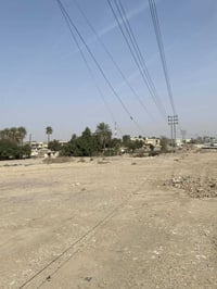 أرض تجارية • خلف دائرة النسيج • ٤٢٥م