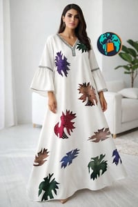 فستان 2026 • طبعات خريفية • فصوص كريستال