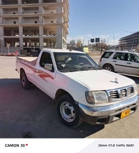 نيسان • ٢٠٠٢ • مانيوال