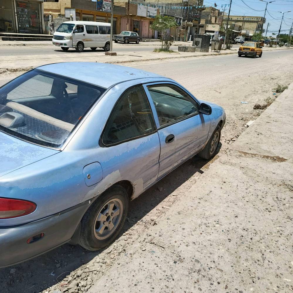 سياره مسيبوبوشي ميراج 1994 تك باب كير عادي كير محرك مكفولات غرفته نضيفه الكشر شوفة عين رقمه ديالى مكاني بغداد سبع البور***********