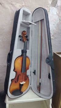 كمان • للبيع