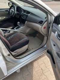 نيسان سنترا • ١٦٠٠ • رقم بغداد