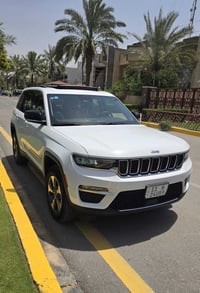 جيب هايبرد بلاكن ٢٠٢٤ فول مواصفات ماشيه ٤٣ الف ميل رقم بغداد بأسمي  تح...