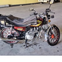 مديل ٢٤ • دراجة نارية • راوه