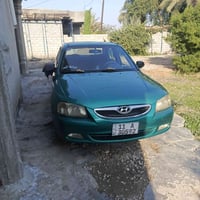 اكسنت 2001للبيع 07765479440