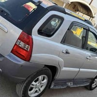 سبورتج للبيع موديل 2008رقم بغداد كير محرك جدد باتري جديد تخم تاير جديد...