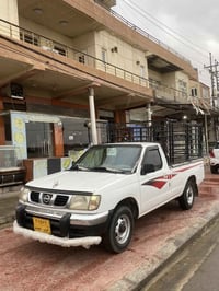 نيسان ٢٠٠٢ • بدون دهان • تاير وجنط جديد