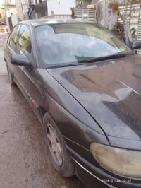 اوبل 94بغدادمكفولةمن الصبغ محرك كيربطة2500تبريدقطعتين شغال تخم تايم جد...