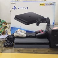 ps4 slim 500G 9.00 مهكر كامل ملحقات والكارتون + ذراع اصلية و وذراع تجا...