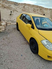 نسان فرسه 2009 رقم انكليزي جديد مصفره غرامات هيه  سياره بسمي مكينه حدا...