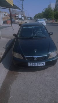 مازدا ٣٢٣ • كير ومكينة شرط • أربيل