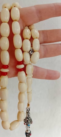 مسبحة عاج • ٣٣حبة • محلاية فضة