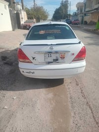 صني ٢٠٠٤ • رقم بغداد • انكليزي