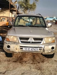 باجيرو 2003 1_رقم بغداد نكليزي باسمي  2_دفع رباعي 3_سته6 سلندر 4_محرك3...