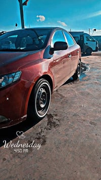 كيا سيراتو  1600 دوش المرغوب موديل 2010 خليجي السيارة تخم تاير خط ابيض...