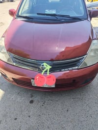 فيرسا 2009 للبيع مصبوغة حزام  السعر 55 بغداد الكرخ 07738006656