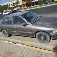 بروتون ٢٠٠٢ • مسجلة ٢٠٣١ • بطاقة بنزين